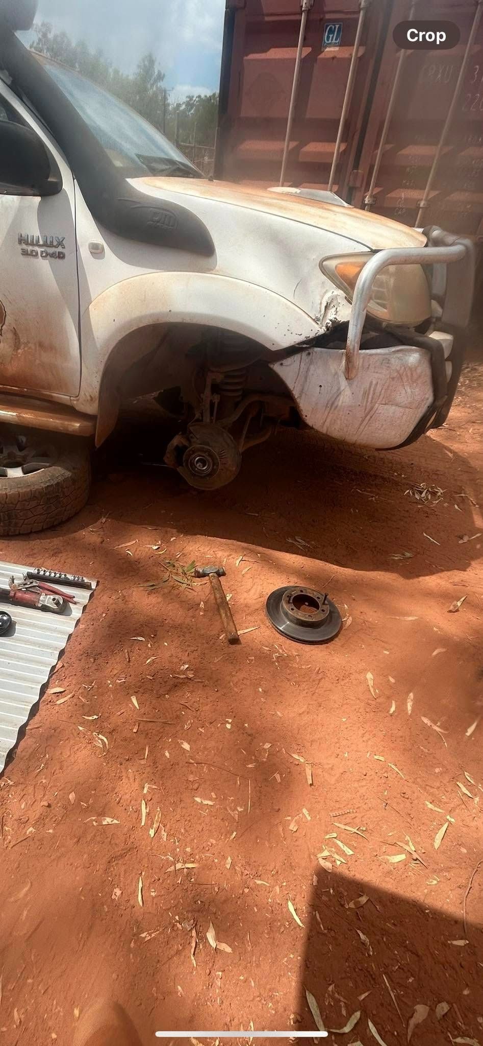 A White Truck With a Missing Front Tyre — Full Noise Mechanical in Humpty Doo, NT 
