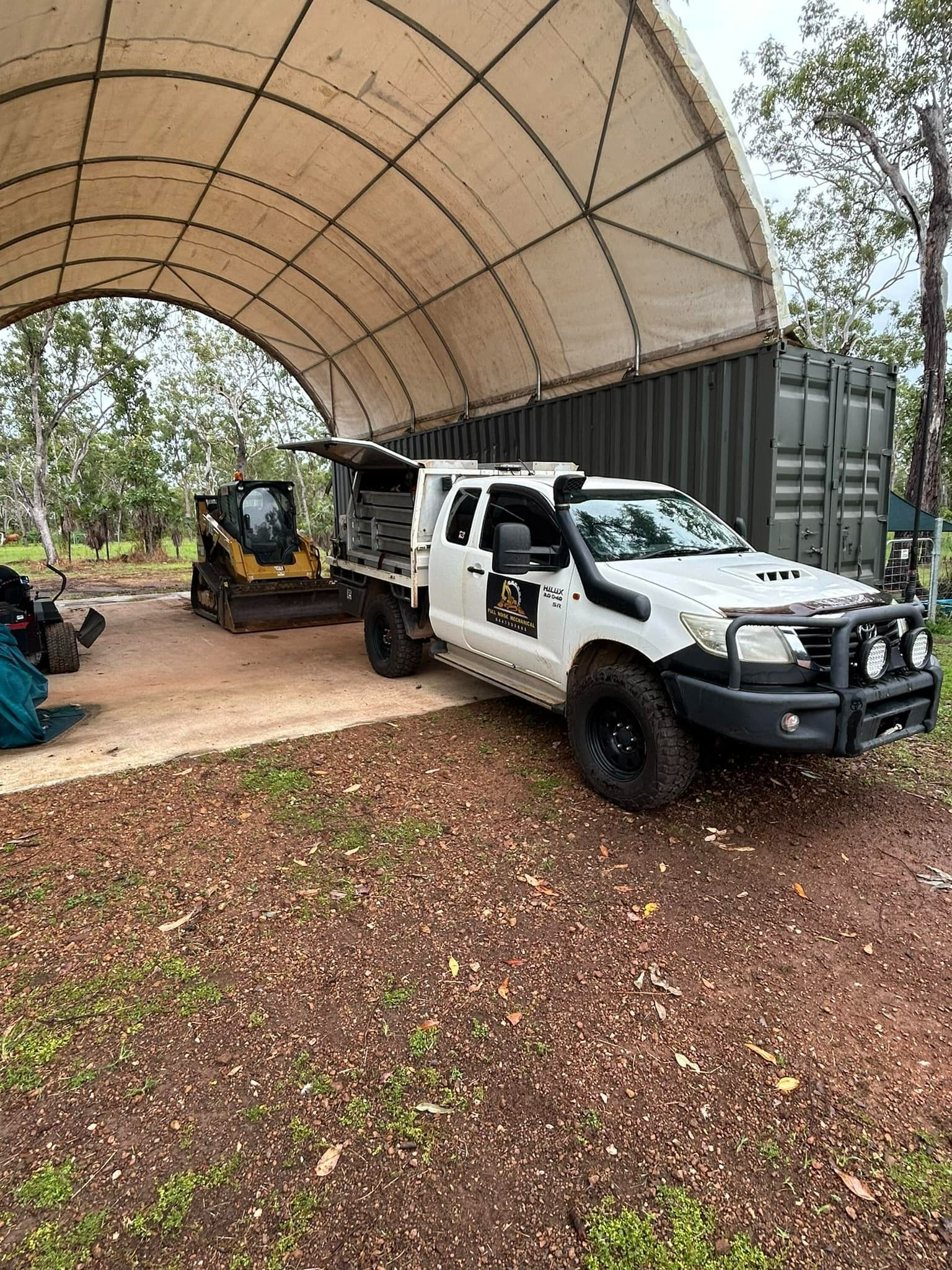 White Pickup Truck with A Skid Steer Under — Full Noise Mechanical in Humpty Doo, NT