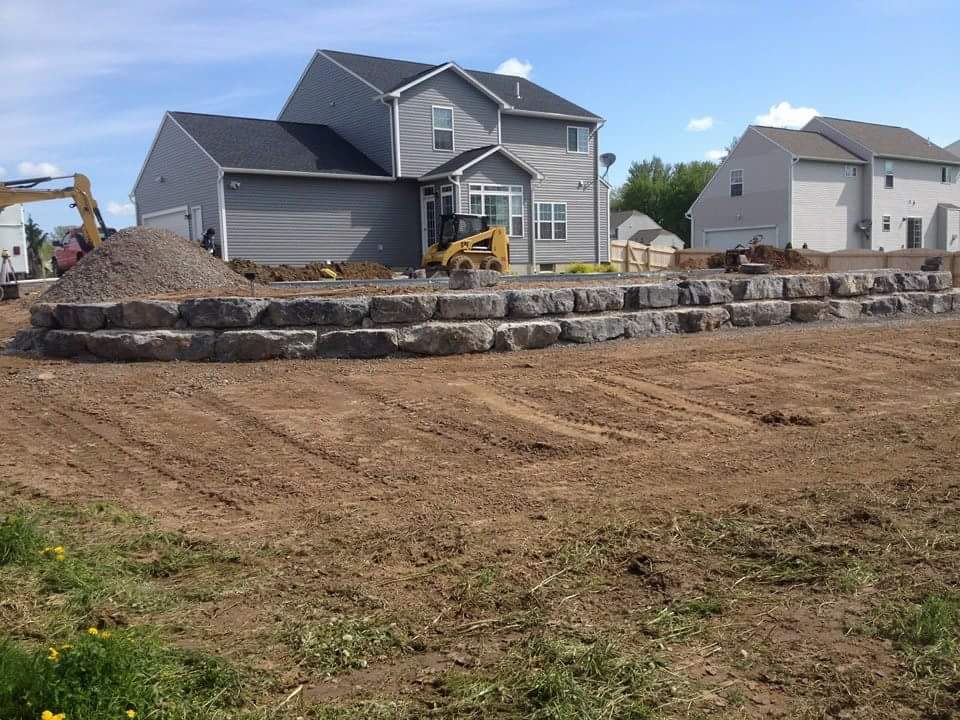 A large house is being built in a residential area.
