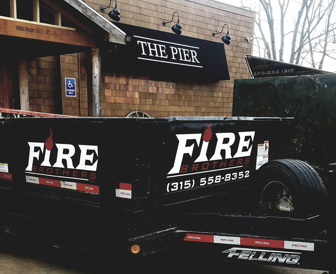 A fire truck is parked in front of a building