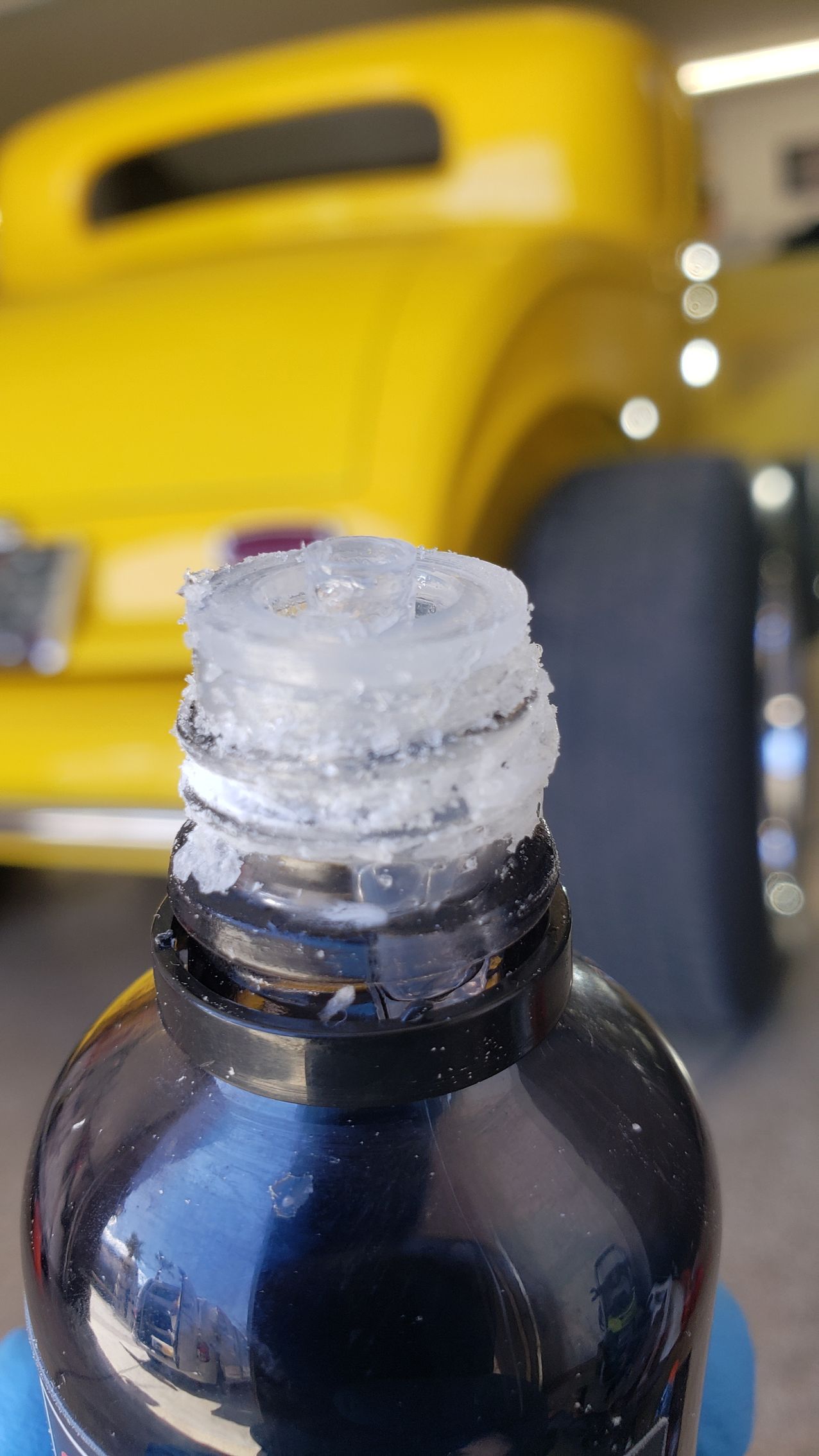 ceramic coating bottle that has hardened under the cap