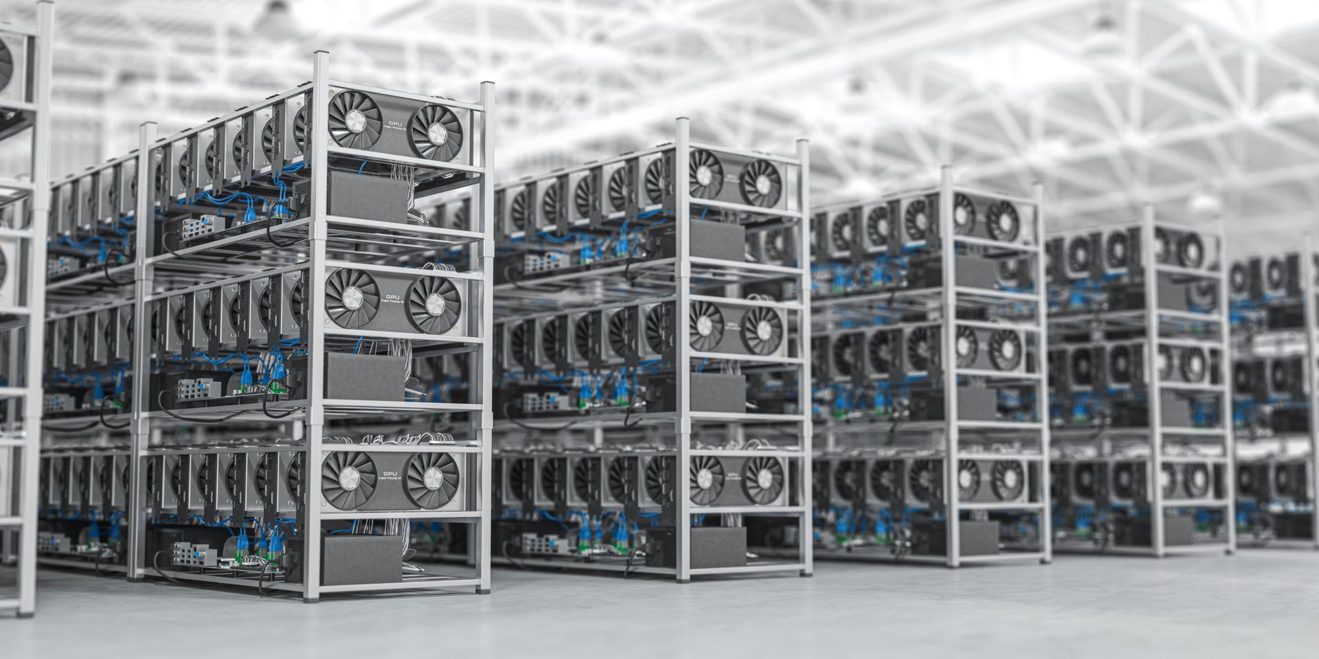 bitcoin mining facility with crypto mining servers and computers stacked on shelves