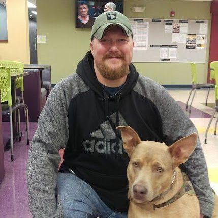 Chris and Nassira - a vet and his support dog.