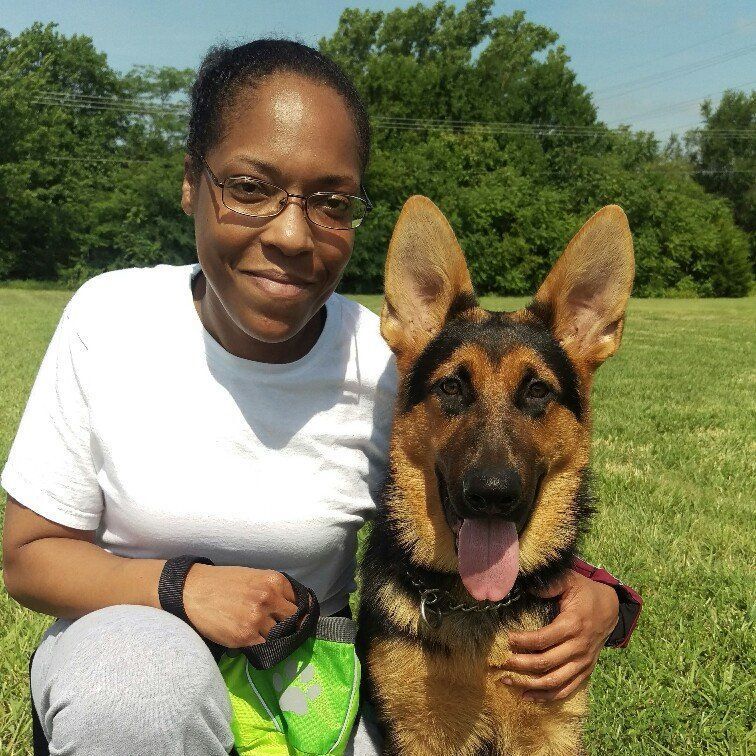 Erica and Batman - a vet and her support dog.