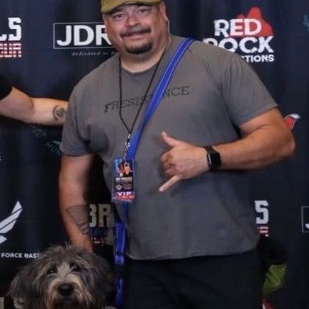 Gene and Nondo- a vet and his support dog.