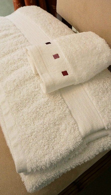 Crisp clean towels in the bluebell room