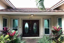 Glass Doors — House with Wood Door and Glass Windows in Deerfield Beach, FL
