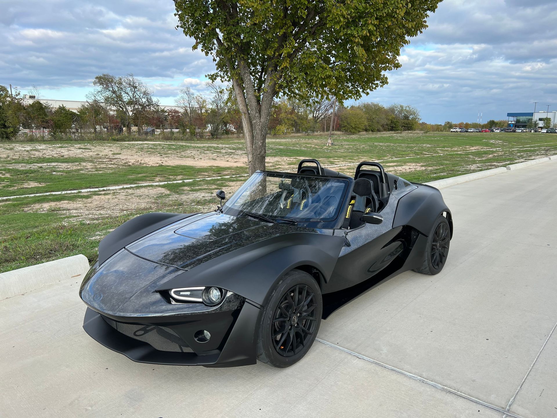 Vinyl Carbon and Wrap black convertible car
