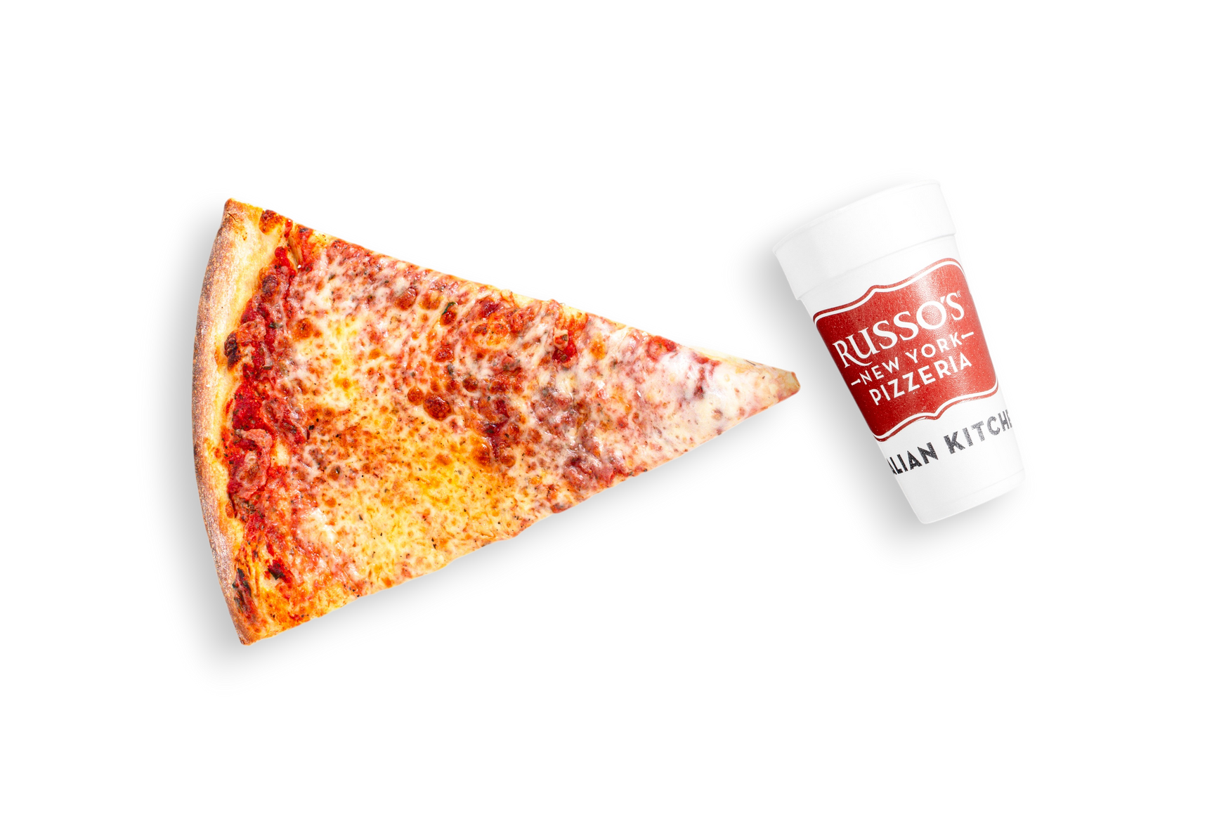 Slice of pizza next to a white container with 