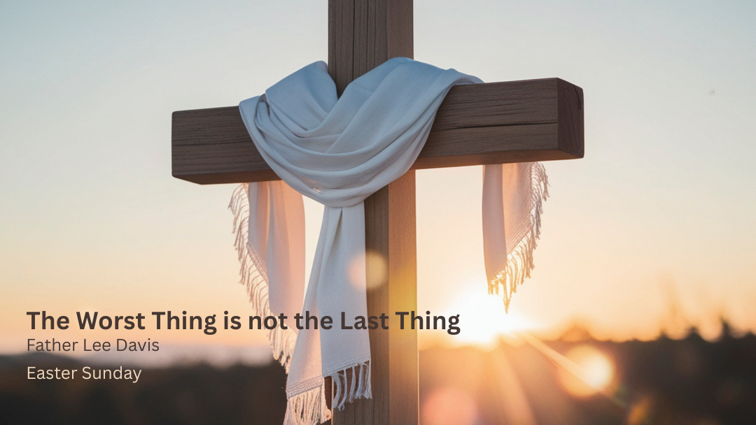 Cross with white fabric draped at sunrise