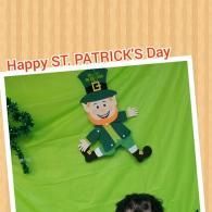 Happy St. Patrick’s Day sign with a green leprechaun on a green background