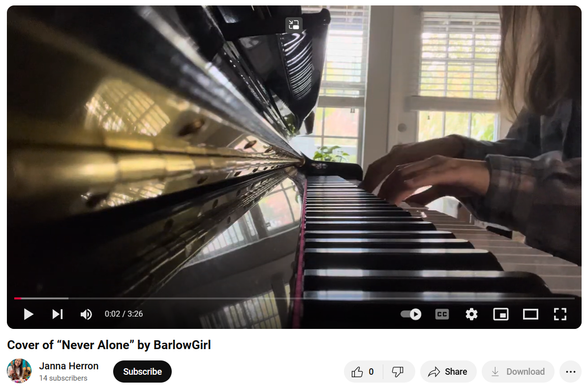 A person is playing a piano in a video.