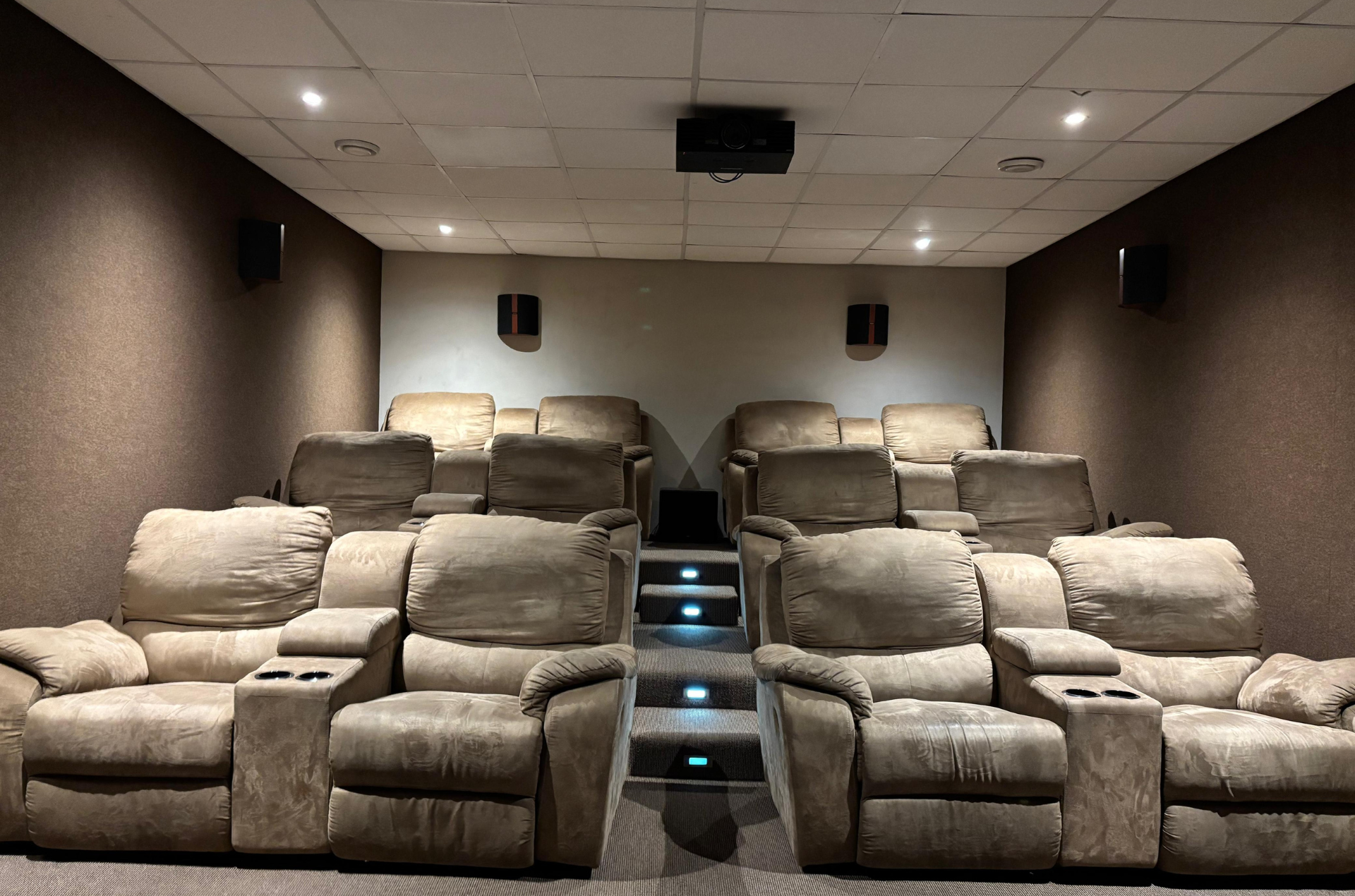 Eggs Benedict with smoked salmon, hollandaise sauce, and microgreens on a white plate.