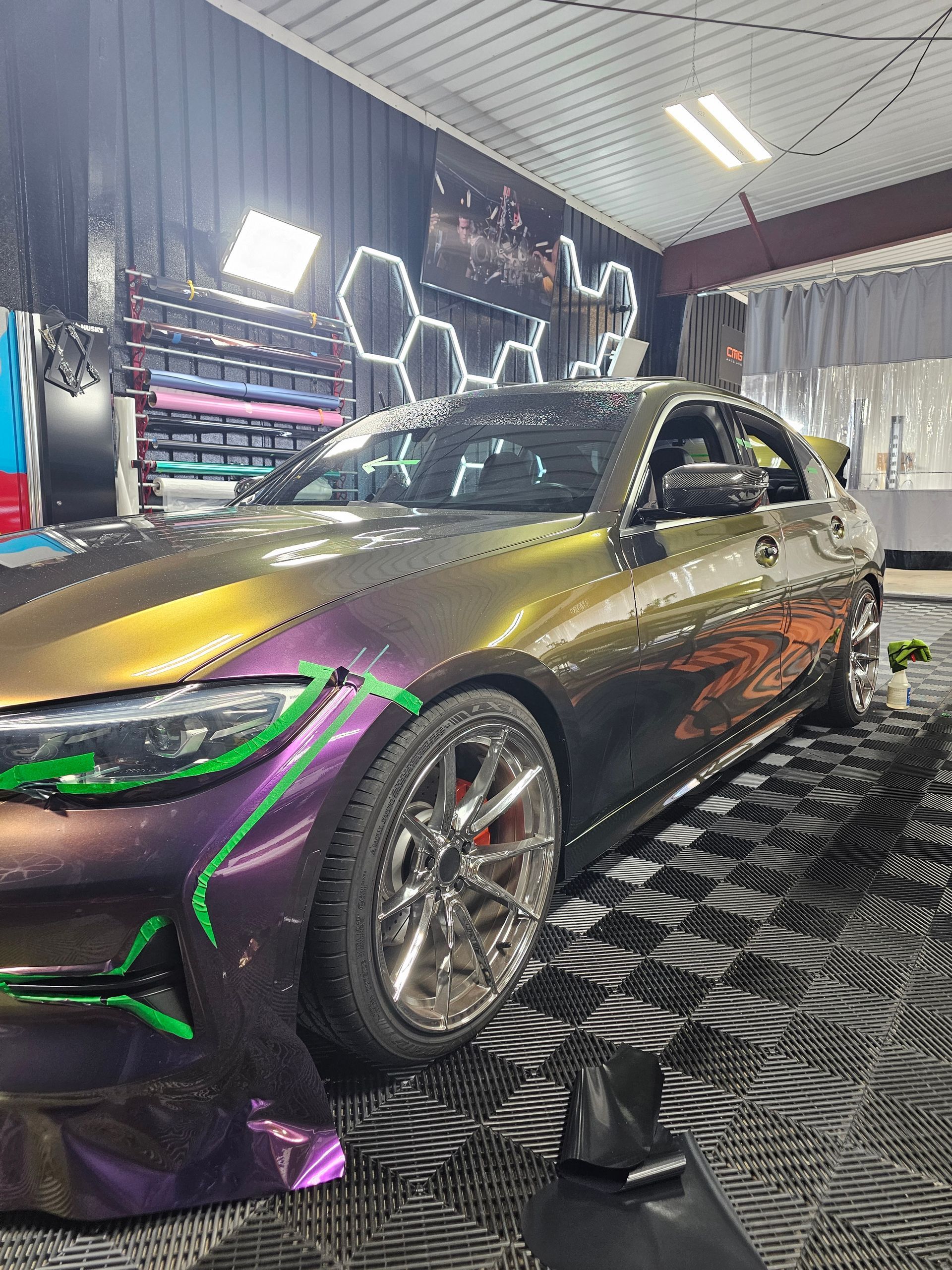 Blue car door with the handle and lock visible.