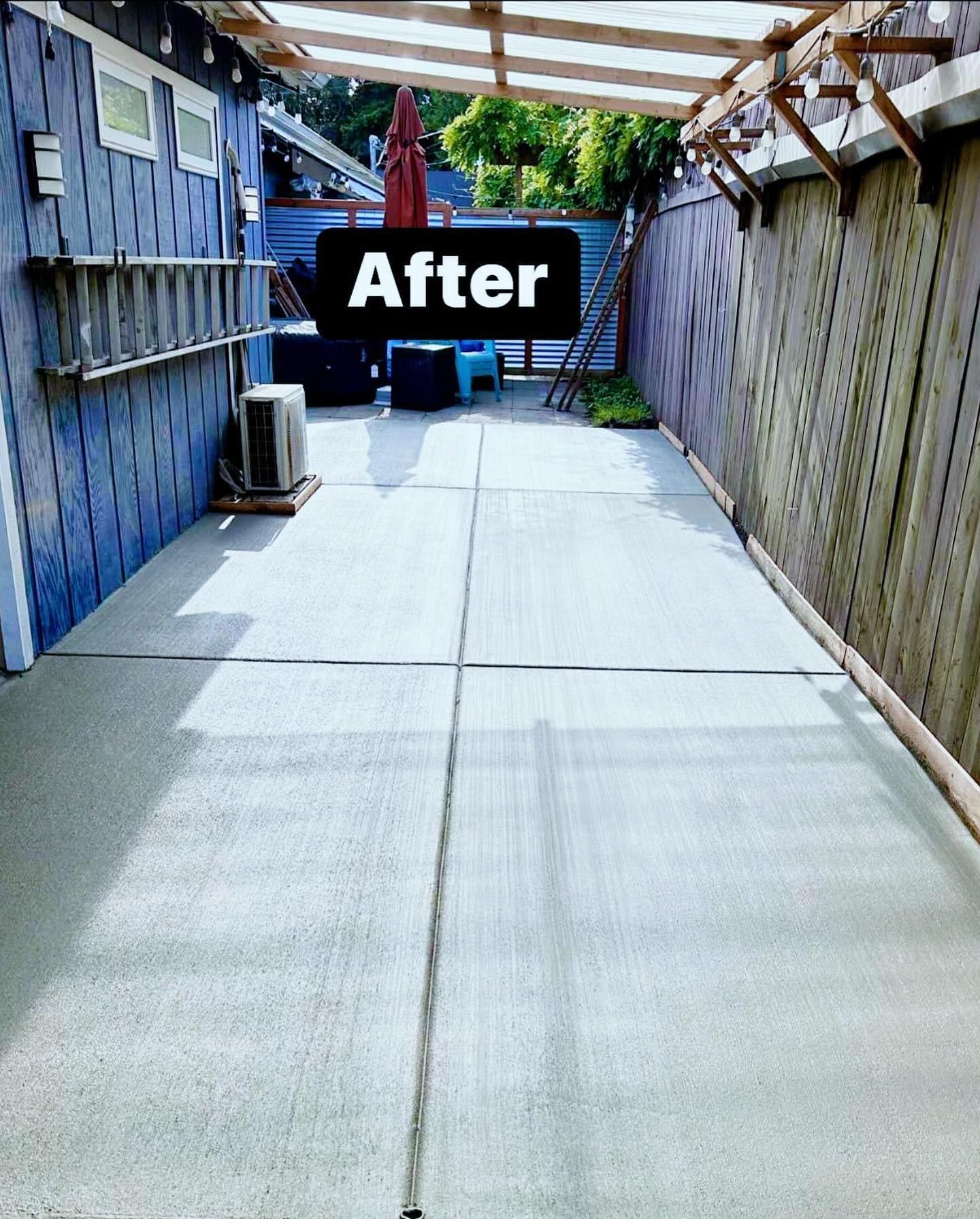 A picture of a walkway in a yard with a sign that says after | Everett, WA | JMS Concrete & Construction LLC