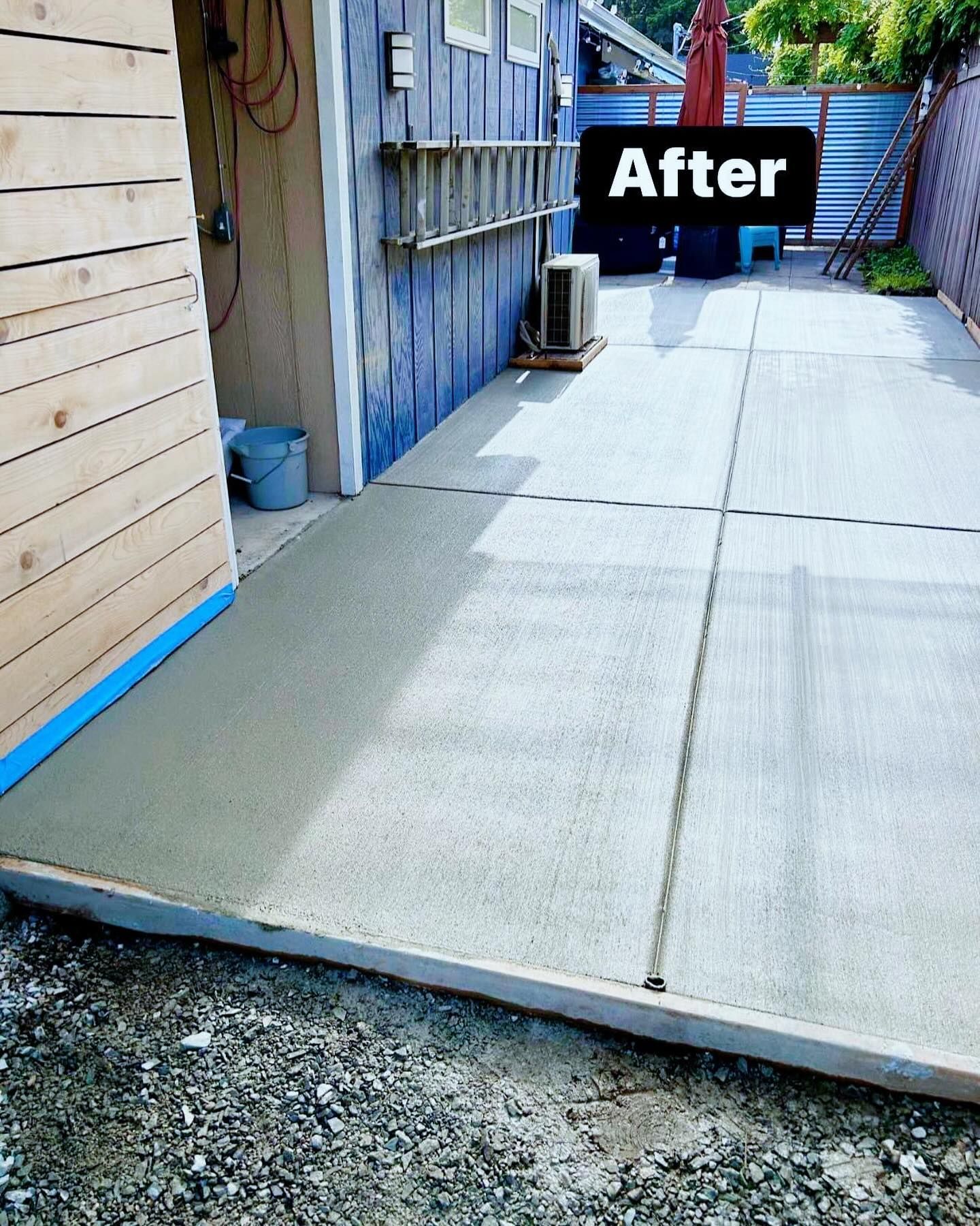 A picture of a walkway in a yard with a sign that says after | Everett, WA | JMS Concrete & Construction LLC