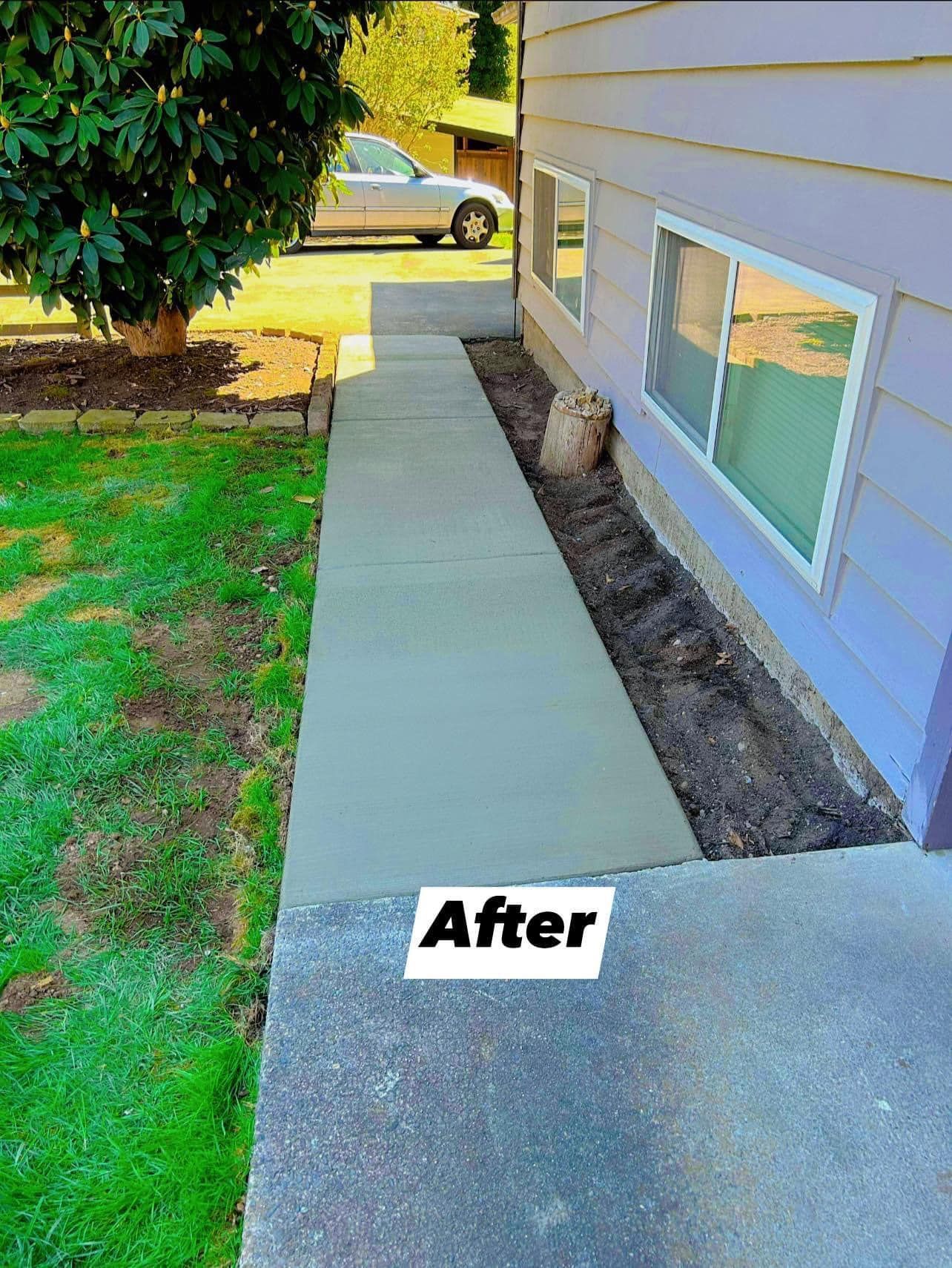 A concrete sidewalk is being built in front of a house. | Everett, WA | JMS Concrete & Construction LLC
