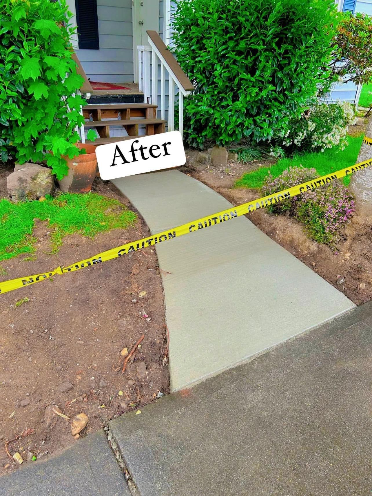 A concrete walkway with stairs leading up to a deck. | Everett, WA | JMS Concrete & Construction LLC