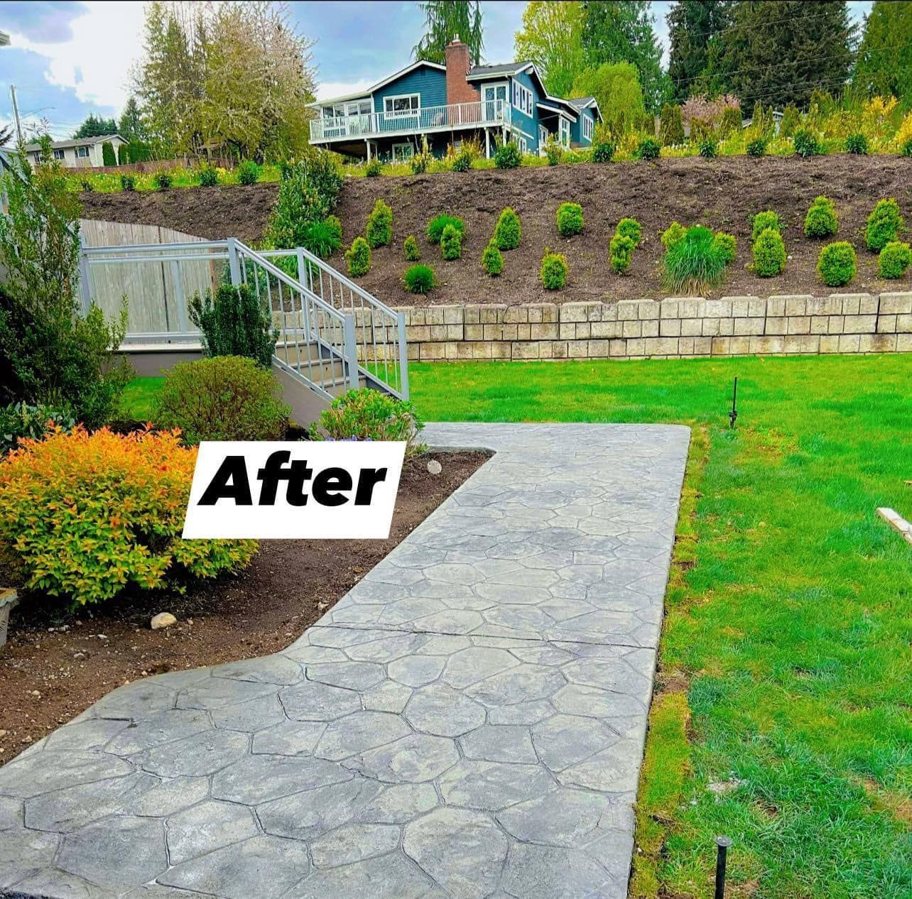 A picture of a walkway in a yard with a sign that says after | Everett, WA | JMS Concrete & Construction LLC