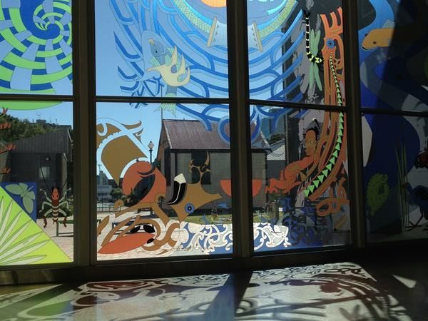 a window with a colorful painting on it