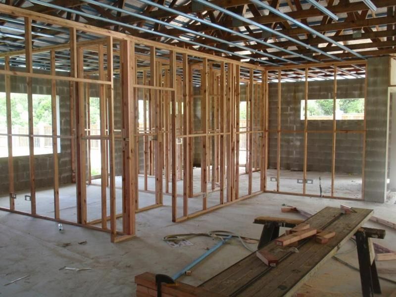 The Inside Of A Building Under Construction With Wooden Frames — Justmill Carpentry & Building in Smithfield, QLD