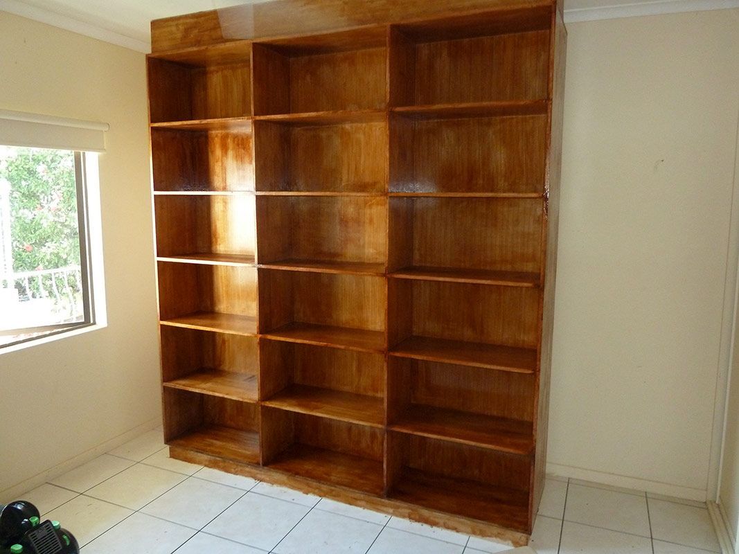 A Room With A Lot Of Shelves And A Window — Justmill Carpentry & Building in Smithfield, QLD