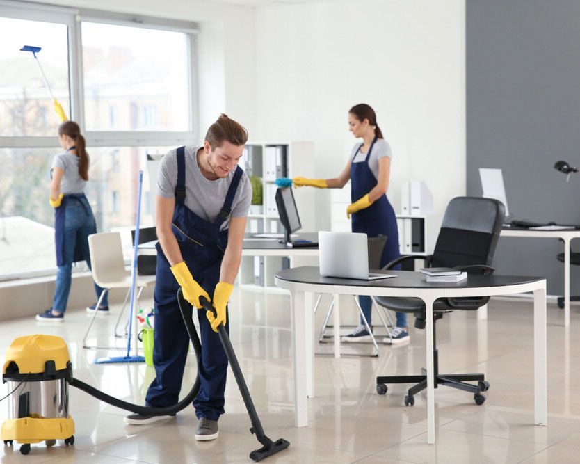 Professional Janitors Expertly Cleaning an Office Space - Comprehensive Cleaning Services in Ballina