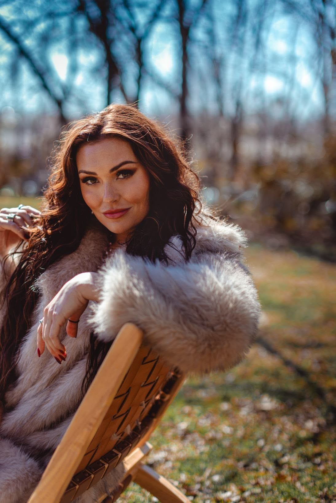 A man is standing in front of a crowd of people at a concert.