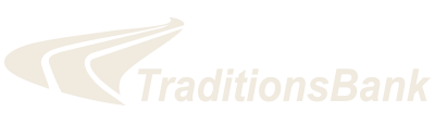 A white logo for traditions bank on a white background.