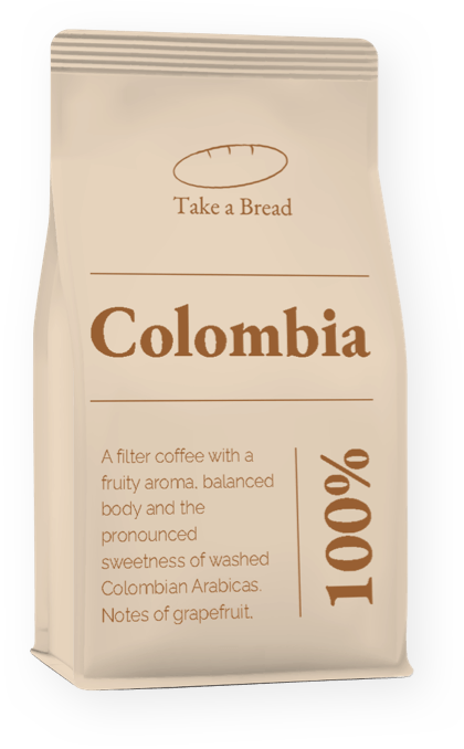 A bag of colombia coffee beans is sitting on a white surface.