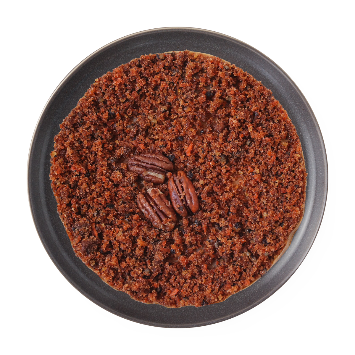 A bowl of brown sugar with pecans on top