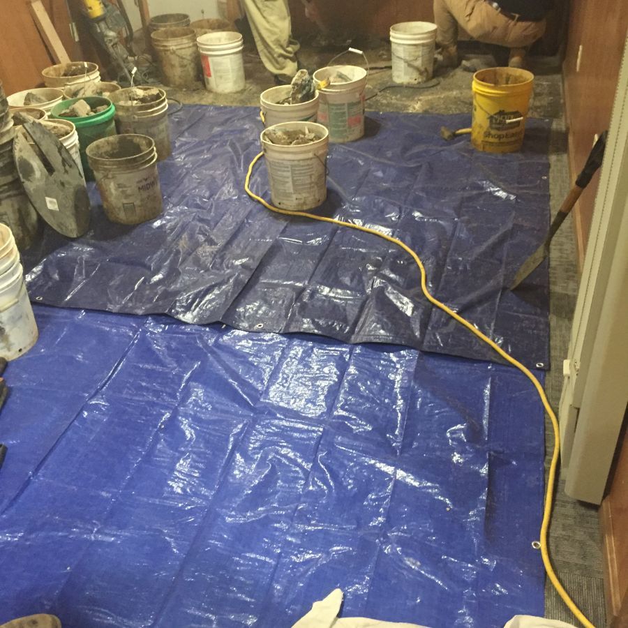 French drain contractors working at jobsite in Erie, PA