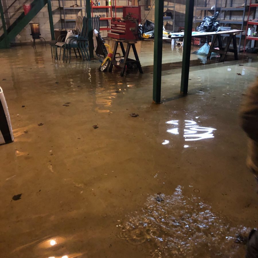 Wet basement flooded by a couple inches of water in Erie, PA