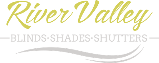 A logo for river valley blinds shades and shutters.
