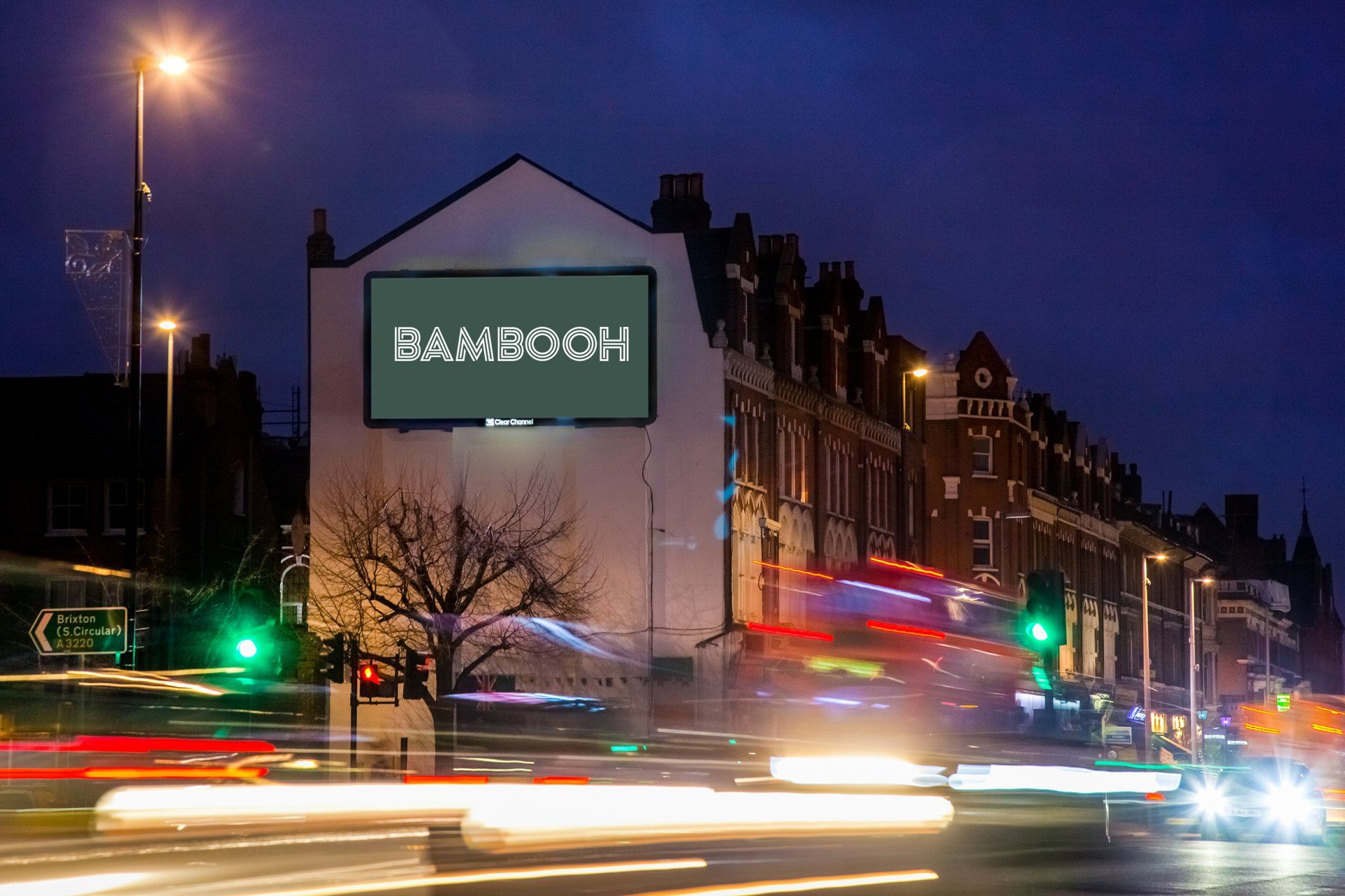 A billboard on the side of a building with the word bambooh on it.