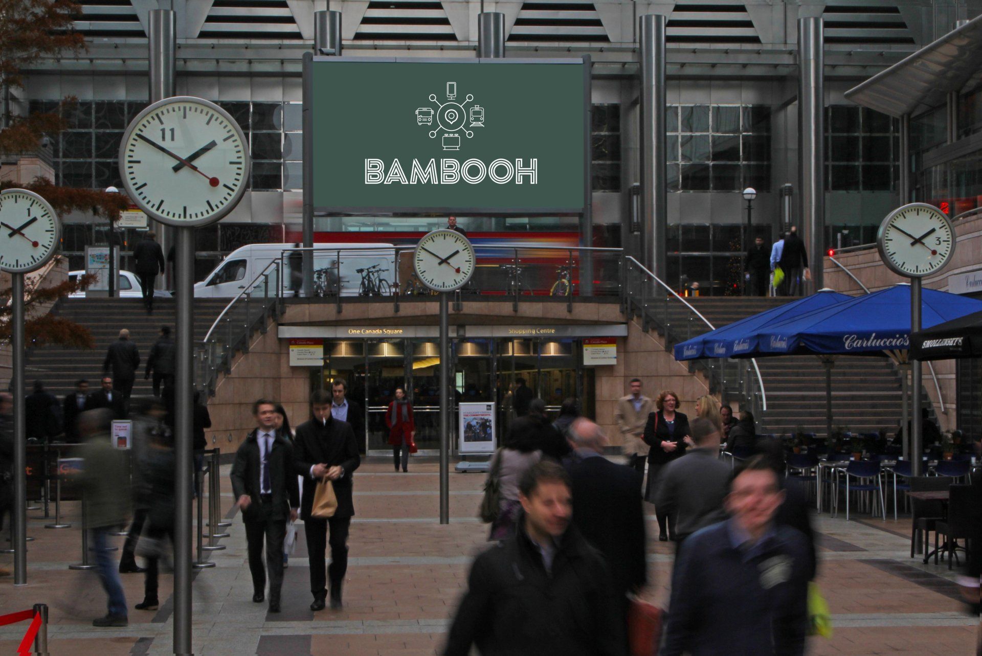 People walking in front of a building with a sign that says bambooh