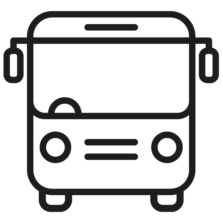 A black and white icon of a bus on a white background.