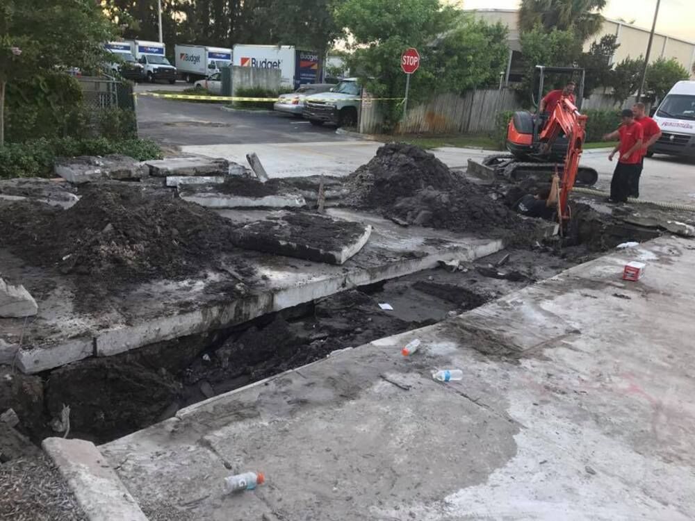 plumbing excavation for main sewer line repair