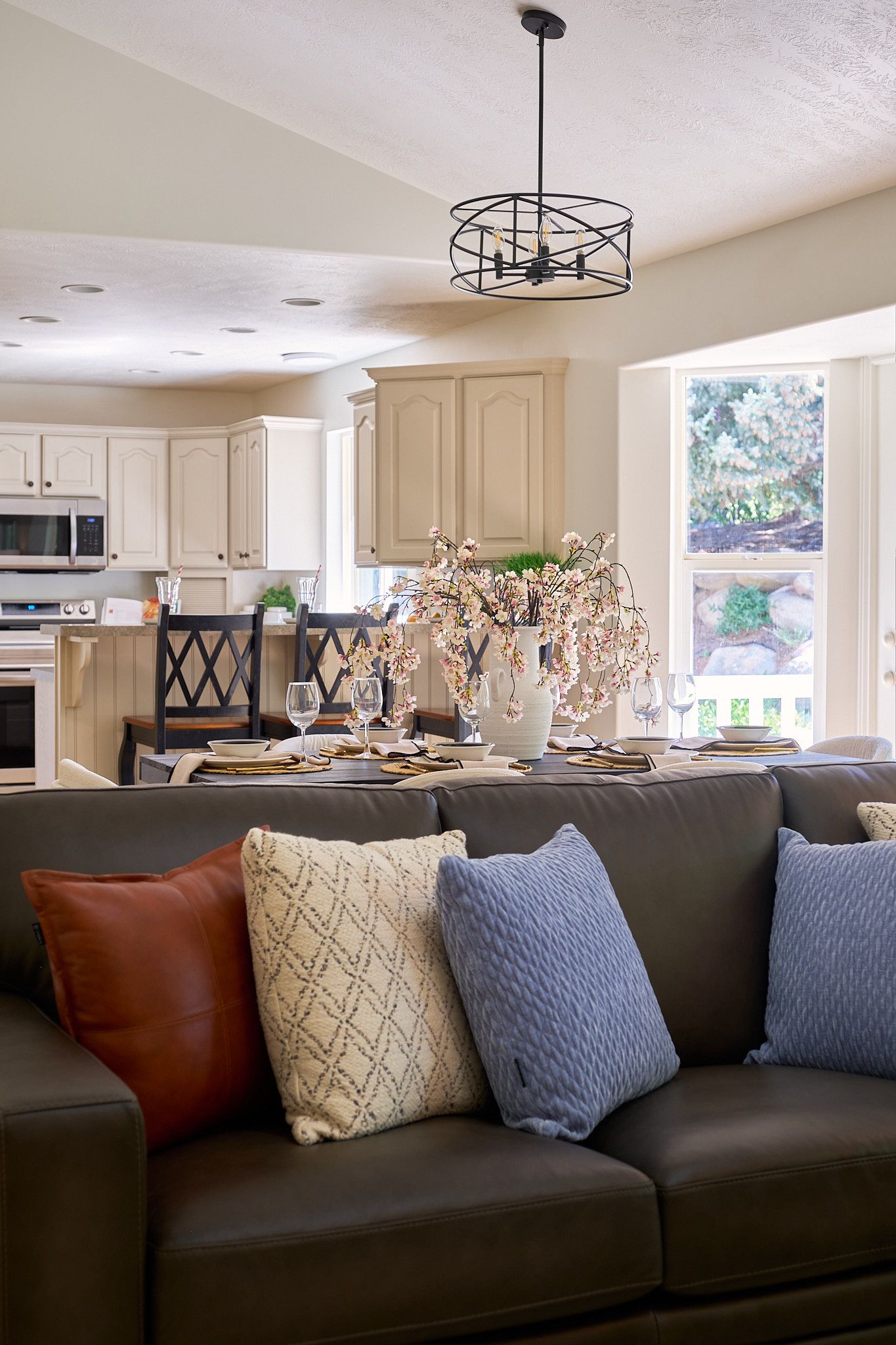 Person holding a video camera on a stabilizing rig.