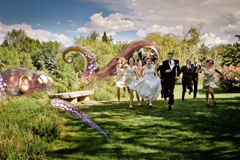 A wedding party runs across a grassy field away from giant, purple-spotted octopus tentacles emerging from the garden.