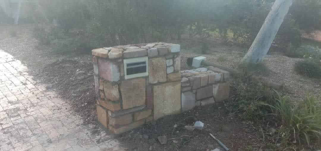 A Stone Wall With a Mailbox in the Middle of It — Queanbeyan East, NSW — Traditional Stone Structures