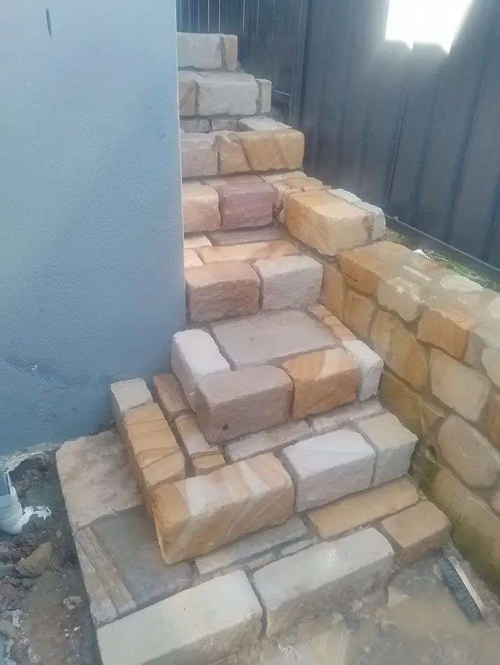 A Set of Stairs Made of Bricks Next to a Wall — Queanbeyan East, NSW — Traditional Stone Structures