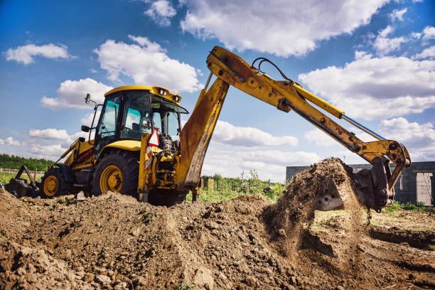 A Yellow Excavator — Queanbeyan East, NSW — Traditional Stone Structures