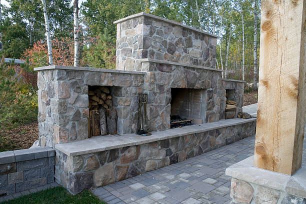 A Stone Fireplace is Sitting on Top of a Brick Patio — Queanbeyan East, NSW — Traditional Stone Structures