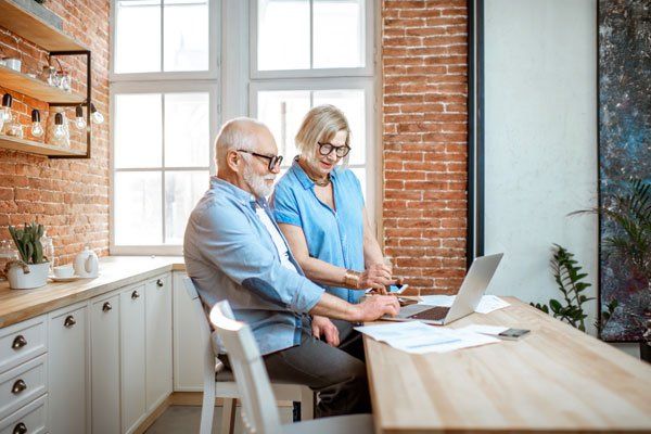 A couple working on a computer