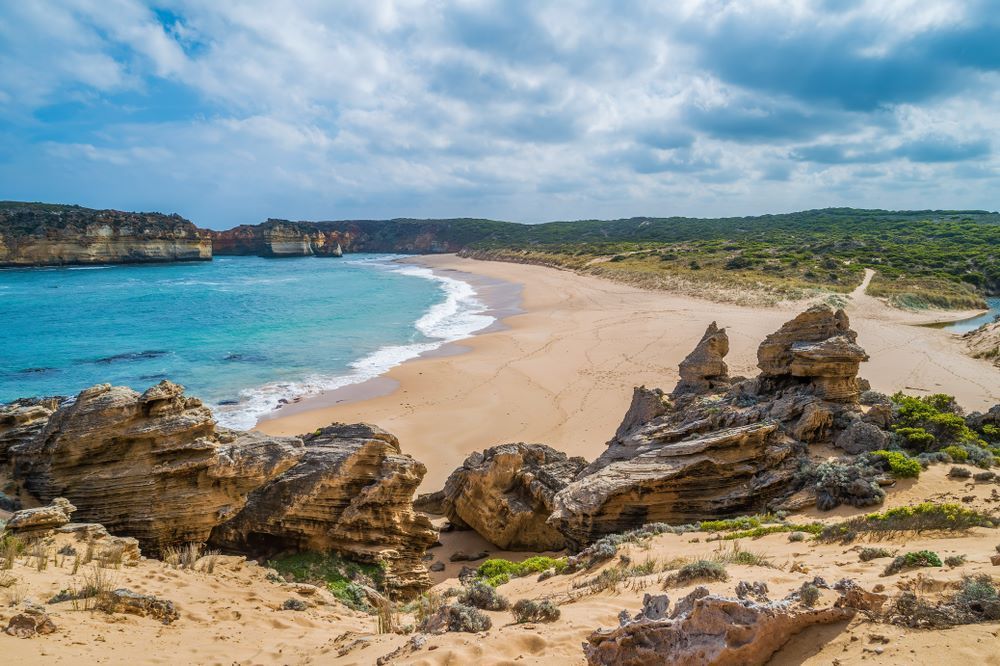 A Sandy Beach With Turquoise Water — BTV Antenna & Data in Childers, QLD