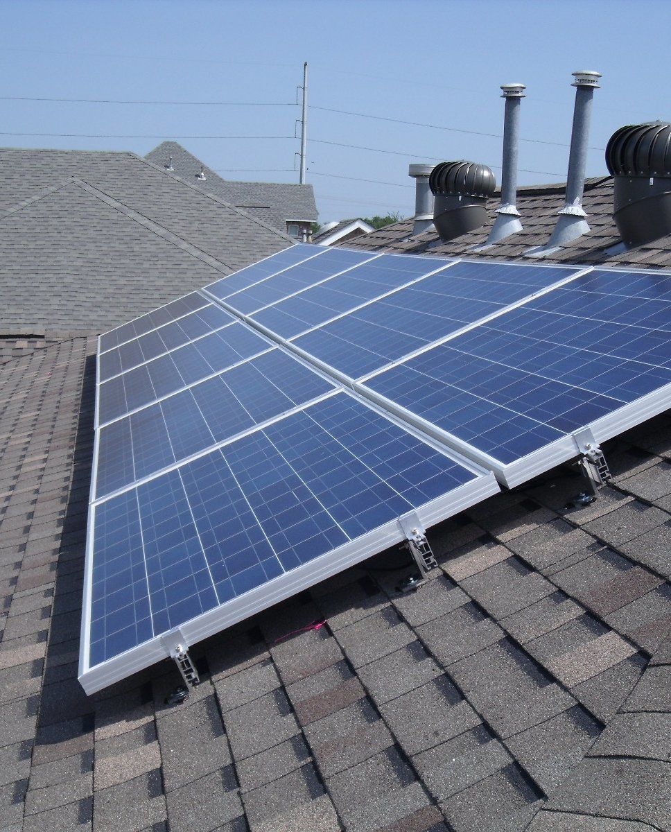 solar panel system installed on roof of house