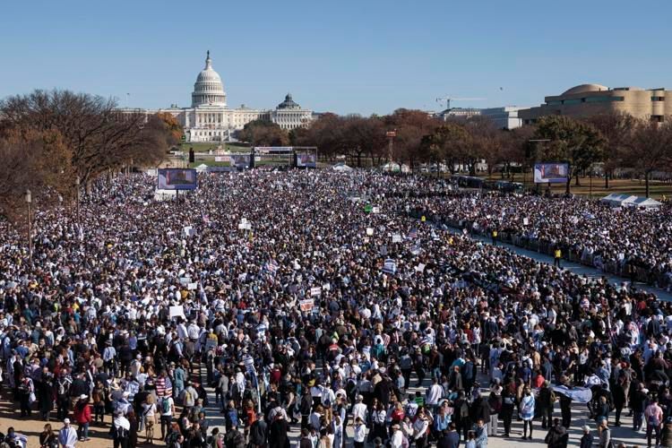 a large crowd of people are March for Israel event in front of the capitol building