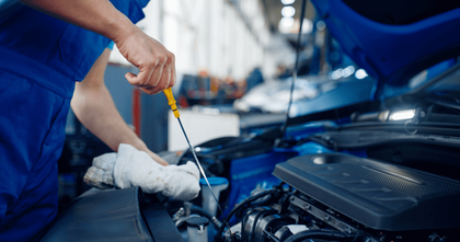 mechanic doing an oil change