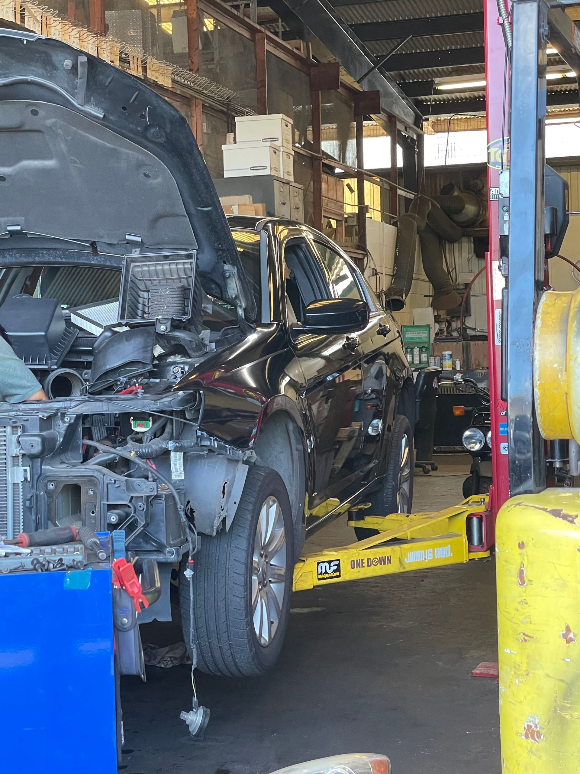 Black car with open hood